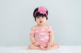 portrait of cute asian baby on white