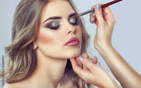 makeup artist makes smoky eyes makeup