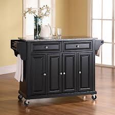 A doored compartment offers storage for larger kitchen canister items. Crosley Granite Top Kitchen Island Cart Kf30003 At Tractor Supply Co