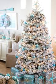 beautifully decorated white christmas trees