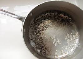 use baking soda to clean pots pans