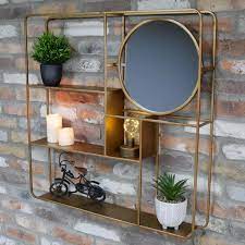 Gold Wall Unit With Shelves And Mirror