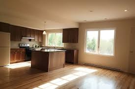 do you install flooring before cabinets