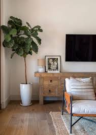 wall mount tv over vine credenza