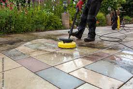 Cleaning Stone Slabs On Patio With The