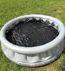 About how long does it take to become hot enough? Woman Shows How To Heat Up Your Freezing Cold Paddling Pool In 45 Mins Using Nothing But Black Bin Bags