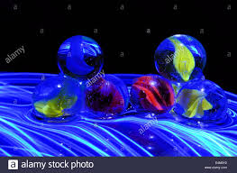 Colored Marbles With Different Lighting Effects Stock Photo