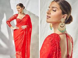 red saree with embellished blouse