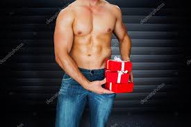 attractive bodybuilder with gifts stock