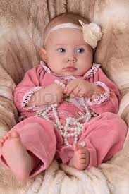 Cute Baby Girl In A Pink Dress Stock Photo Colourbox