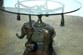 unique elephant table with glass top