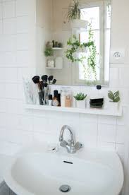 These decorating ideas are simple yet effective. 60 Best Small Bathroom Decorating Ideas Tiny Bathroom Layout Decor Tips Apartment Therapy