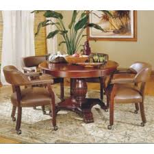 Designing and decorating a dining room is just as difficult as decorating any other room. Steve Silver Tournament Tournament Round Game Table Caster Arm Chair Set Lagniappe Home Store Dining 5 Piece Sets