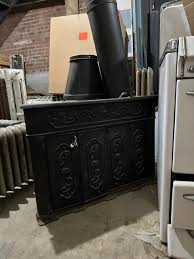Cast Iron Franklin Stove With Sun Motif
