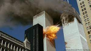 The nature of the collapse of the two world trade center towers and the nearby wtc7 (in this photo, the brown building to the left of the towers) is a major focus of 9/11 conspiracy theories. Fbi Releases Declassified Document On September 11 Attack News Dw 12 09 2021