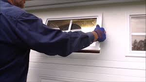 how to change a garage door window