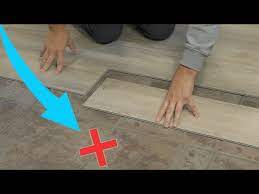 luxury vinyl plank over tile flooring