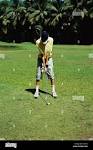 Man playing golf in Willingdon Sports Club golf course ; Bombay ...