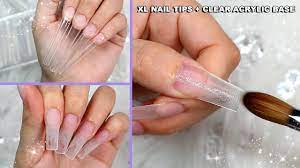 applying nail tips clear acrylic base