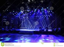 empty stage in blue light beam stock