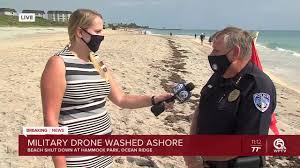 military drone washes as on beach