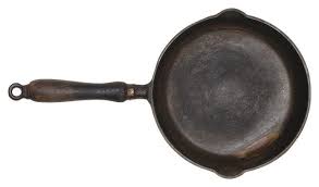 cast iron skillet on a glass cooktop