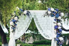 wedding arch decorated with fabric