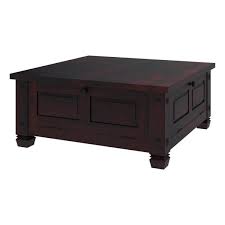 Its solid wooden top area includes a wax finish and it hides a special storage. Russet Solid Wood 4 Doors Square Rustic Coffee Table With Storage