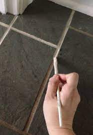 how we got our stained grout white