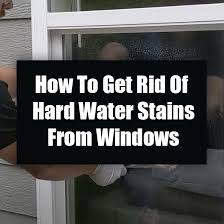 get rid of hard water stains from windows