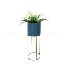 Made from brass with a verdigris whitewashed finish and an elegant embossed scalloped design, our statement standing planter is perfect for medium sized real or faux house plants. Flora Free Standing Planter Blue Pot Vase Planters Flowerpots Furniture Home Decor Bedandbasics