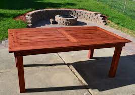 Outdoor cedar furniture displays shades of reddish/pinkish brown in its heartwood, with creamy yellow sapwood that can run right through the heartwood in streaks. Bryan S Site The Finished Diy Cedar Patio Table Diy Patio Table Patio Table Plans Diy Patio Bench