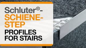 Include edge protection where tile is bordered by. How To Install Tile Edge Trim On Stairs Schluter Schiene Step Profile Youtube