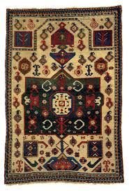 caucasian carpets with book cover design
