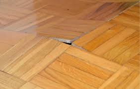 how to fix warped hardwood floors