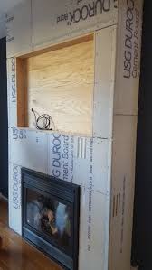 cement board on floor to ceiling fireplace