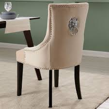 Black and cream upholstered dining chairs. Lion Dining Chair Cream Door Knocker Cream Chair Cream Velvet Dining Chair