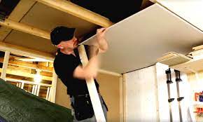 installing a plasterboard ceiling by
