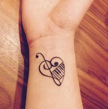 Among the music tattoos that contain more than two musical instruments, this one is shaped like a heart; 50 Sacred Heart Tattoos For Guys 2021 Broken Bleeding Crying