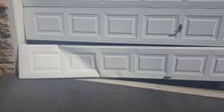 garage door panel replacement call