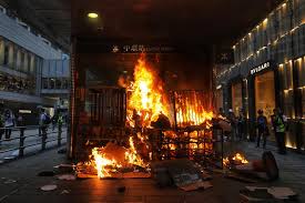 radical demonstrators set fires on