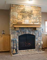 hang art on a stone or brick fireplace
