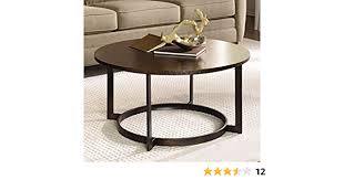 Our copper tables are made similarly. Amazon Com Hammary Nueva Round Cocktail Table In Copper Home Kitchen