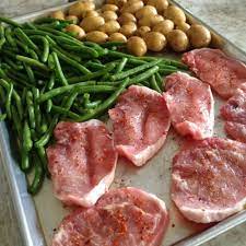 baked thin pork chops and veggies sheet
