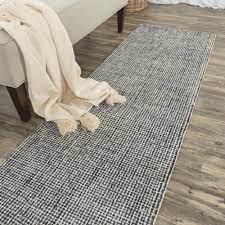 hand tufted loop pile wool rug 9 x 12