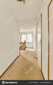 wood trim door carpet floor ceiling