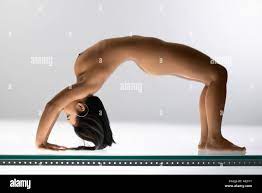Filipino nude young adult woman in backbend pose Stock Photo - Alamy