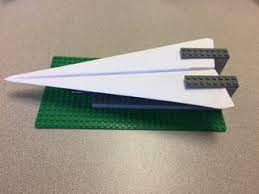 A piece of office paper. Lego Paper Airplane Launcher 6 Steps Instructables
