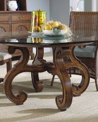 round glass dining table wood base