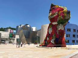He is known for turning his ideas into giant works of art and also for making millions of dollars when selling these pieces. At The Guggenheim Museum Bilbao Jeff Koons Puppy Gets A Colorful New Coat The Guggenheim Museums And Foundation